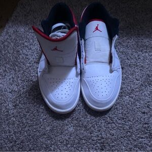 Red and white Jordan 1 lows